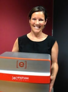 Enphase’s Olivia Smith holds a prototype of the AC Battery unit, which will weigh 18kg