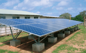 PNG schools lit up by solar and batteries – delivered by banana boat