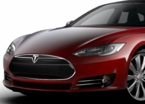 Could a Tesla test drive cure Abbott government’s deep denial?