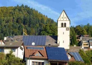 The Priest who broke the law (for solar), and the village that bought back the grid