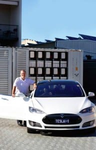 Simon Hackett takes delivery of big battery array, charges up office and Tesla