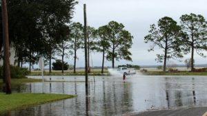 Supermoon floods warn of crisis facing Donald Trump