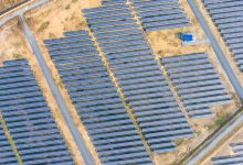orange Top view of Photovoltaics Solar Farm in Rural Area - optimised