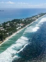 Australia opens door to Pacific climate refugees weeks after approving gas “carbon bomb”
