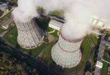 Aerial view of cooling towers on power plant - optimised