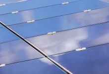 Close up array of thin film solar cells or amorphous silicon solar cells or photovoltaics in solar power plant - optimised