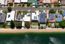 Solar Panels on Suburban Waterfront Homes power ledger - optimised