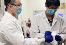 PhD candidates and lead authors Hansen Wang, left, and Zhiao Yu, right, testing an experimental cell in their laboratory. Source: Stanford University