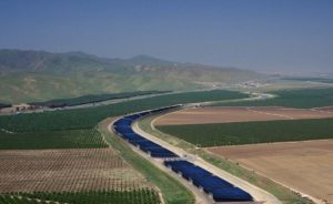 Installing solar panels over canals could yield water, land, air and climate payoffs