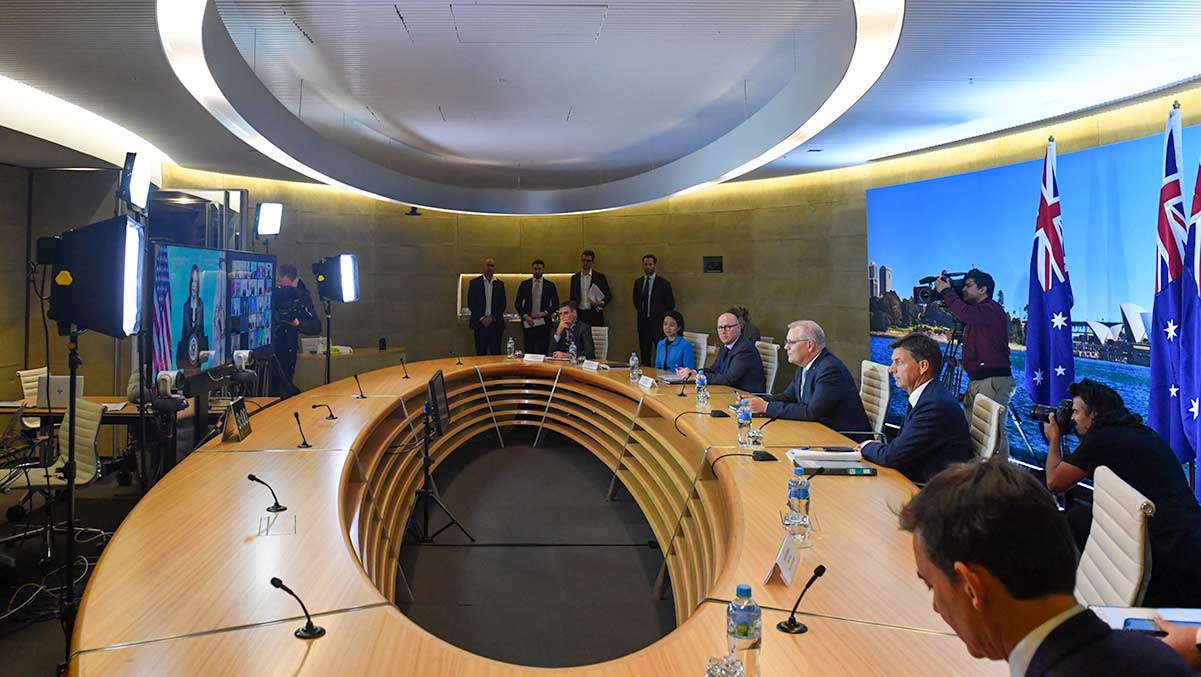 Minister for Energy Angus Taylor and Prime Minister Scott Morrison look on for the opening remarks of the Leaders Summit on Climate hosted by United States President Joe Biden in April. (AAP Image/Mick Tsikas)