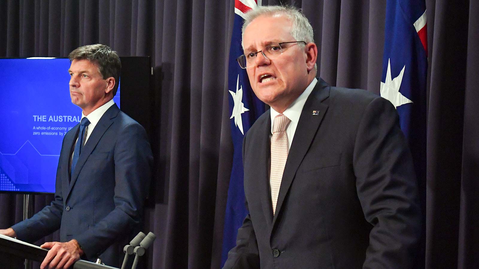 Minister for Energy Angus Taylor and Prime Minister Scott Morrison speaks to the media during a press conference at Parliament House in Canberra. (AAP Image/Mick Tsikas).