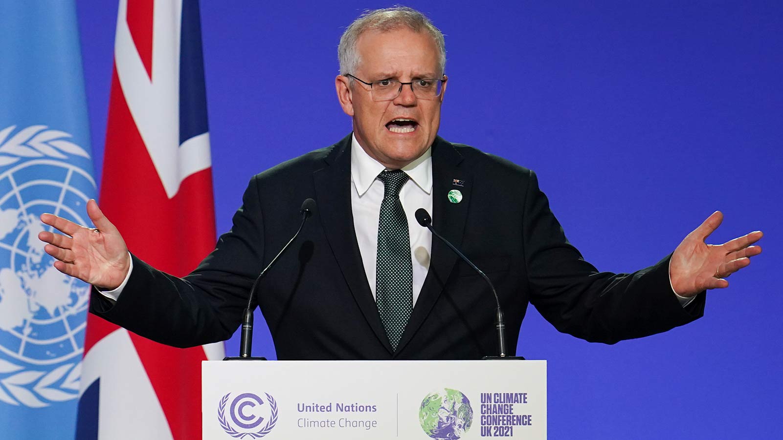 Scott Morrison, Prime Minister of Australia delivers an address, during the COP26 Summit in Glasgow. (Ian Forsyth/AP)