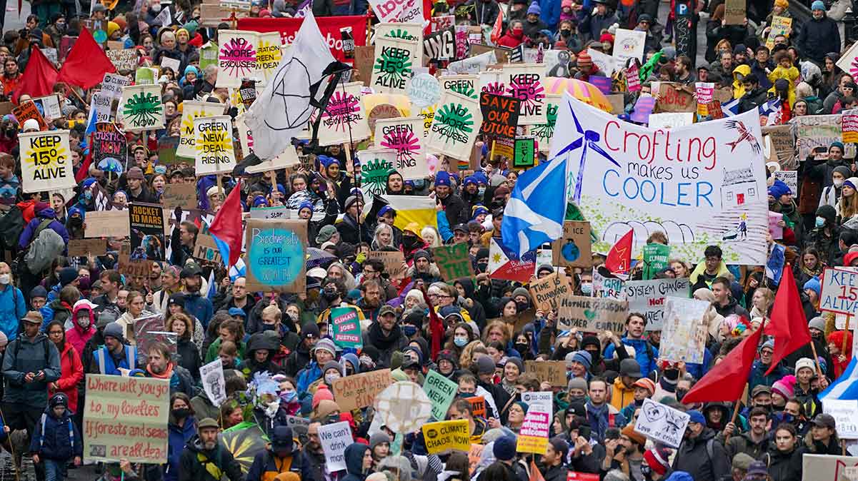 Protesters take part in a rally organised by the Cop26 Coalition in Glasgow demanding global climate justice. Credit: PA/Andrew Milligan.