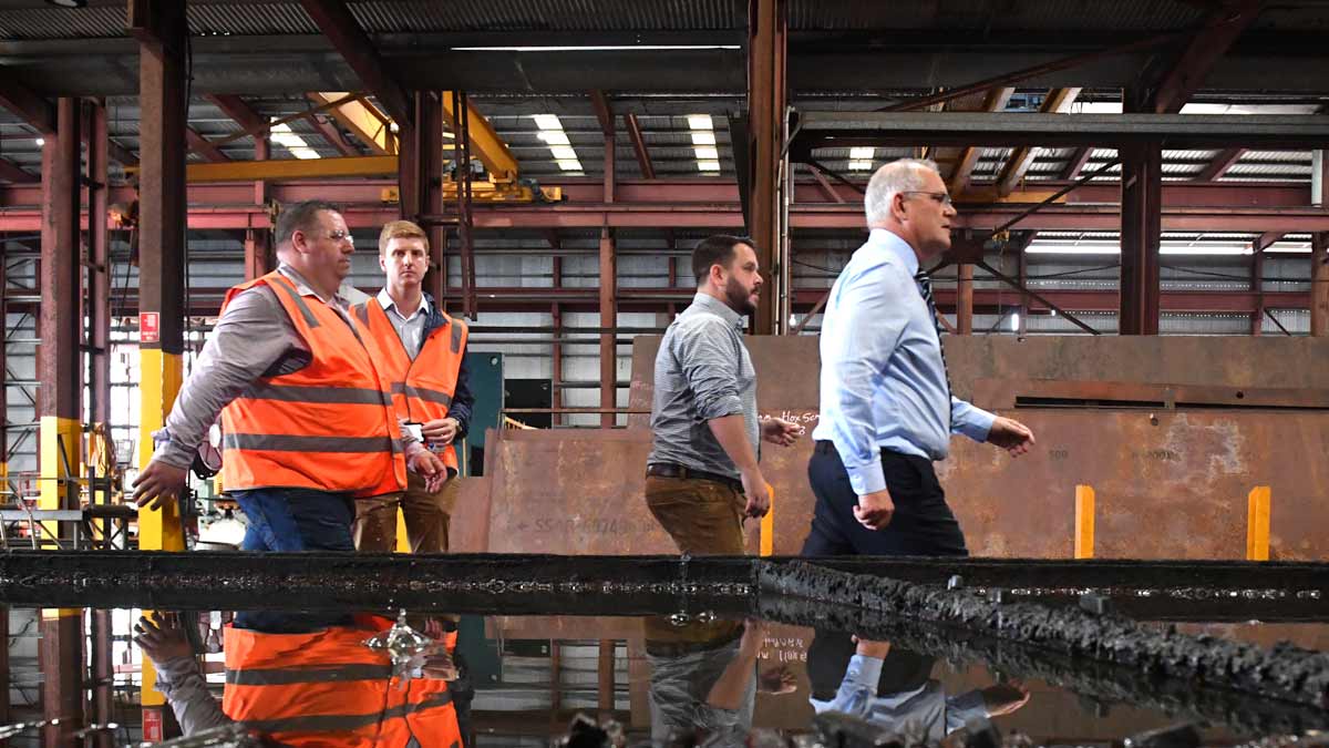 Prime Minister Scott Morrison during a visit to Tei engineering and steel fabrication company on Day 16 of the 2022 federal election campaign, in Townsville. (AAP Image/Mick Tsikas)