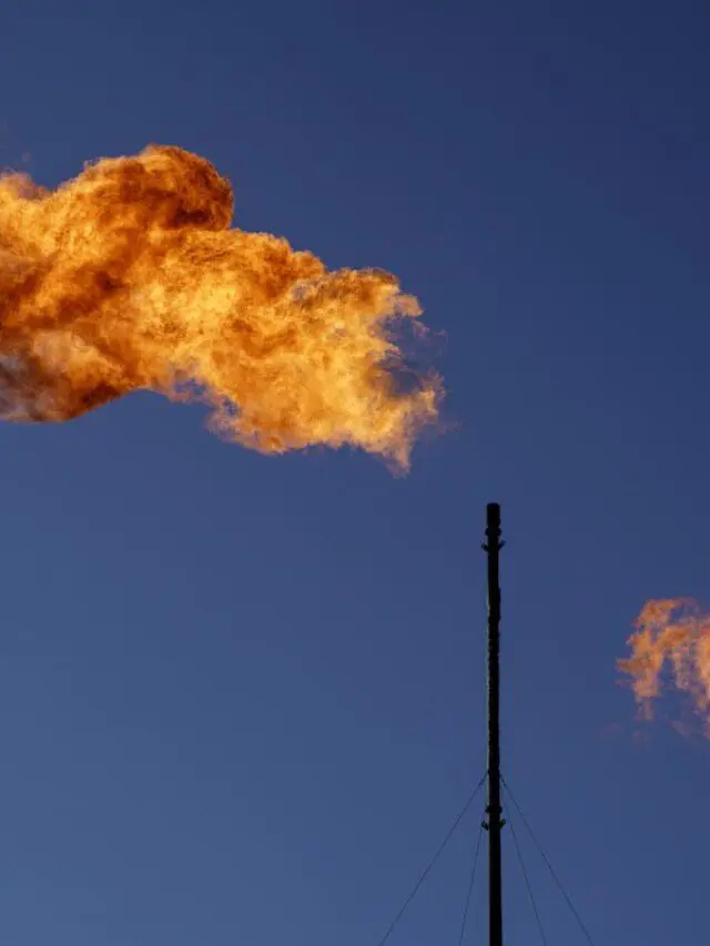 Flares burn off methane and other hydrocarbons at an oil and gas facility in Texas