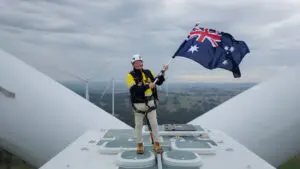 Andrew Forrest waves goodbye to “coal-fired monster” as he opens new wind farm