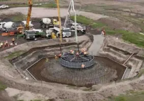 First turbine goes up at Australia’s largest wind farm, foundations laid for big battery