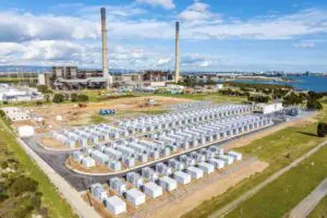 AGL hails performance of first big battery, says waiting for nuclear would put it out of business