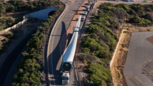 First turbine blade leaves port for epic road trip to mine’s remote renewable microgrid