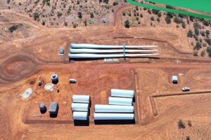 Wind turbines ready to install at remote mine microgrid, after making longest road journey of 850km