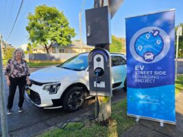 Network offshoot to roll out 1,000 kerbside EV chargers after regulatory switch, but not everyone is happy