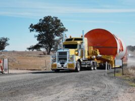 Huge, 100 tonne turbine tower parts begin arriving at the only wind farm under construction in NSW