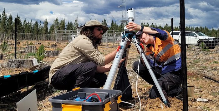 Biosis Emma Heath and Wes Hart installing thermal cameras